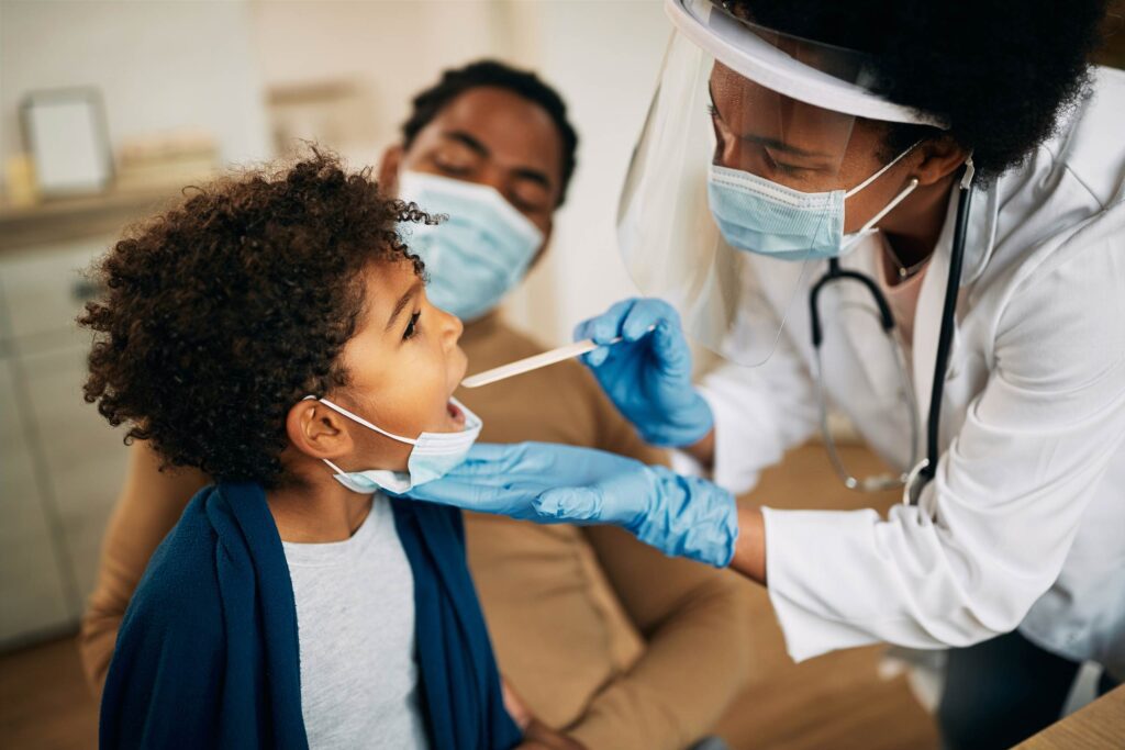 Doctor examining a child patient