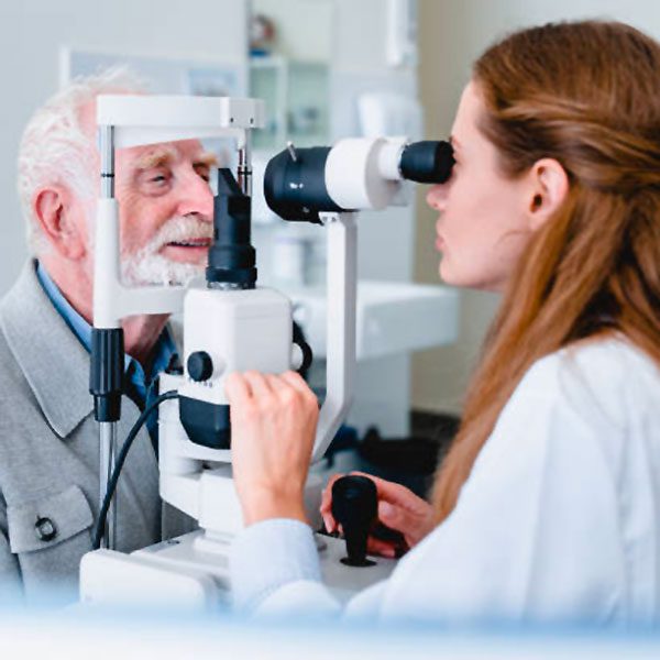 Senior man getting an eye examination