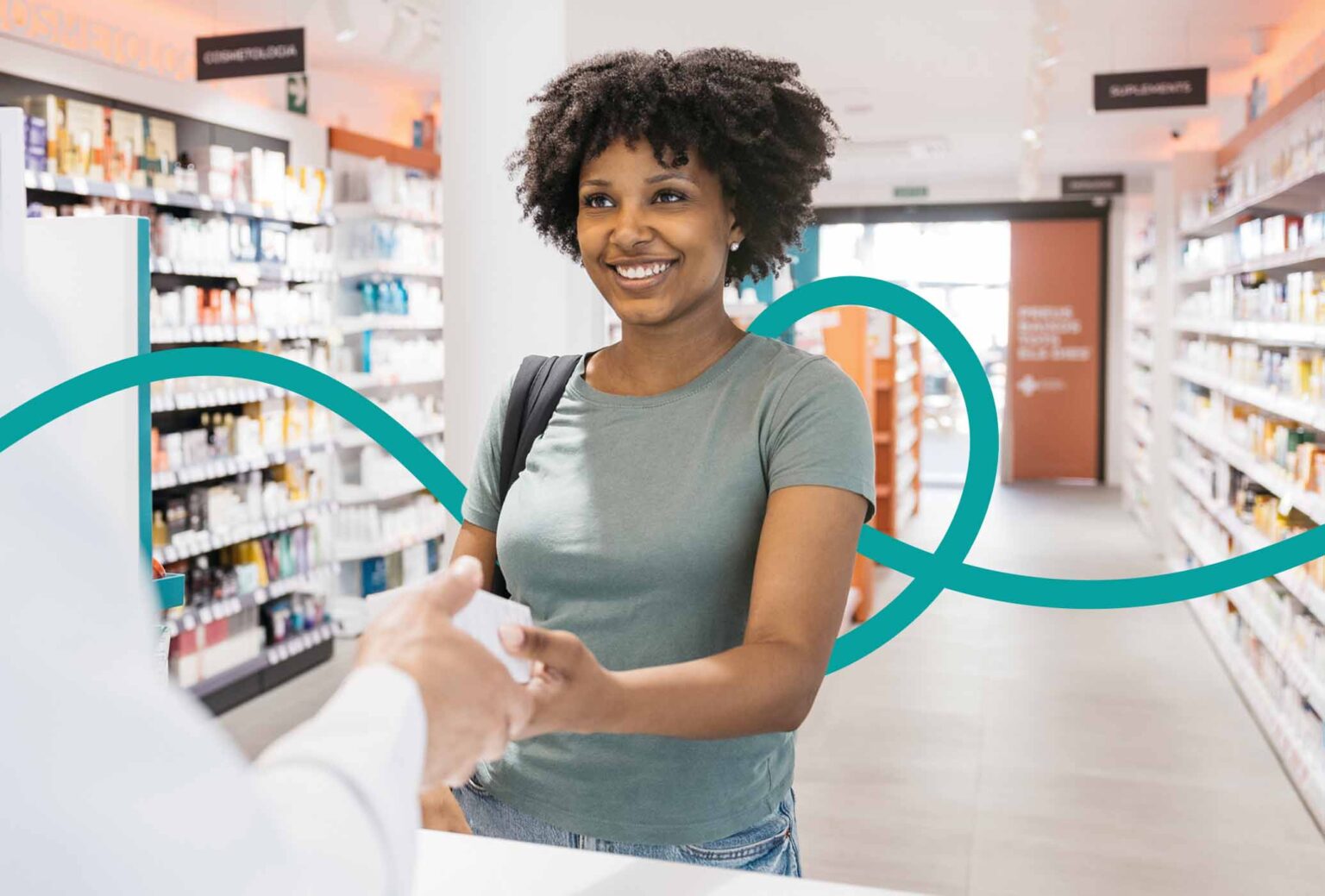 Happy lady picking up her pharmacy prescription.